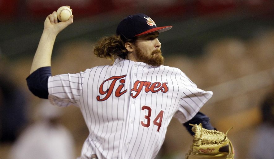 FILE - In this Feb. 3, 2012, file photo, Venezuela's starting pitcher Tyson Brummett throws in the first inning against against Dominican Republic at a Caribbean Series baseball game at Quisqueya stadium in Santo Domingo, Dominican Republic. Former Philadelphia Phillies pitcher Brummett and three others died in a plane crash in rural Utah. The Utah County Sheriff’s Office says ex-pitcher 35-year-old Brummett of Salt Lake City was flying the small plane, which crashed near Box Elder Peak in American Fork Canyon just before 8 a.m. Friday, July 3, 2020. (AP Photo/Fernando Llano, File)