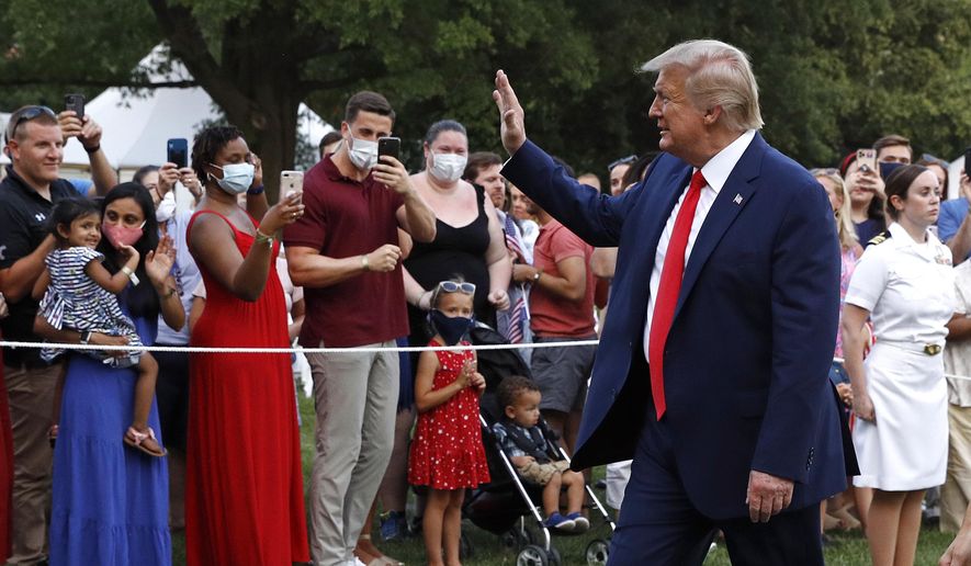 President Donald Trump greets visitors as he walks on the South Lawn of the White House during a &amp;quot;Salute to America&amp;quot; event, Saturday, July 4, 2020, in Washington. (AP Photo/Patrick Semansky)