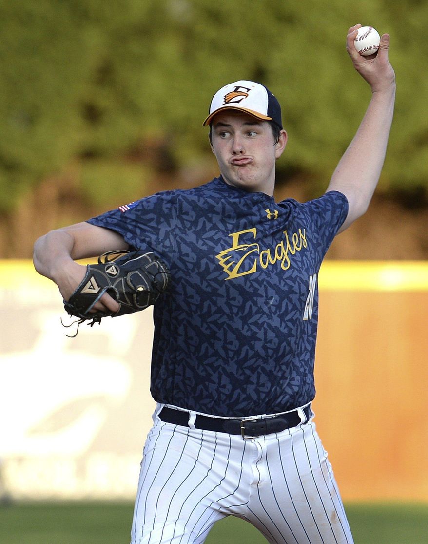 East Meck pitcher Luke Little delivers a pitch to a Myers Park batter during prep baseball action on Tuesday, March 28, 2017 at East Meck High School in Charlotte, N.C. Luke Little had this year’s Major League Baseball draft on his radar, but he waited to make any big plans. Little, a 19-year old left-handed pitcher from Charlotte, weighed the fact that this year’s draft had been cut from 40 rounds to just five. His sophomore campaign at San Jacinto, a junior college in Pasadena, Texas, ended abruptly due to the coronavirus pandemic, and he was slated to transfer and play for South Carolina in the fall. (Jeff Siner/The Charlotte Observer via AP)