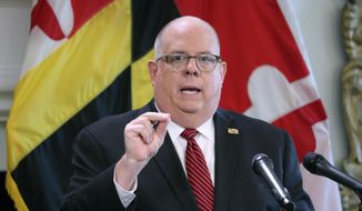 In this June 3, 2020, file photo, Maryland Gov. Larry Hogan announces he will lift an order that closed non-essential businesses during a news conference in Annapolis, Md. Hogan, who considered a primary challenge to President Donald Trump last year, announced Tuesday, July 7 he is releasing a book about national politics and his experience as governor.  (AP Photo/Brian Witte, File)