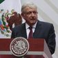 In this April 5, 2020, file photo, Mexican President Andres Manuel Lopez Obrador speaks at the National Palace in Mexico City. For his first foreign trip as president, López Obrador travels to Washington Tuesday, July 7, 2020, to meet with President Donald Trump. (AP Photo/Eduardo Verdugo, File)