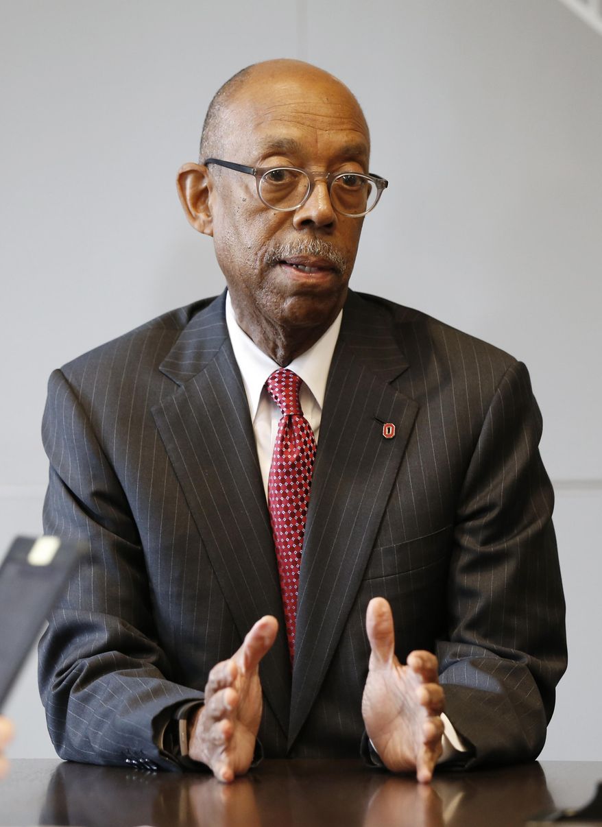 FILE - In this May 17, 2019, file photo, Ohio State University president Michael Drake answers questions during an interview in Columbus, Ohio. The University of California system has named Drake to replace Janet Napolitano and become its first Black president. A physician, Drake was unanimously approved Tuesday, July 7, 2020, by the Board of Regents. (AP Photo/Jay LaPrete, File)