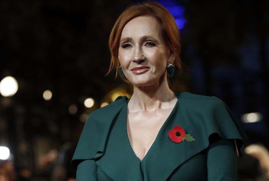 FILE - In this Thursday, Nov. 8, 2018 file photo, writer J.K. Rowling poses for the media at the world premiere of the film "Fantastic Beasts: The Crimes of Grindelwald" in Paris. Dozens of artists, writers and academics have signed an open letter decrying the weakening of public debate, it was announced Wednesday, July 8, 2020 warning that the free exchange of information and ideas is in jeopardy. J.K. Rowling, Salman Rushdie and Margaret Atwood are among dozens of writers, artists and academics to argue against ideological conformity in an open letter in Harper’s Magazine. The letter comes amid a debate over so-called cancel culture - where prominent people face attack for sharing controversial opinions. (AP Photo/Christophe Ena, file)