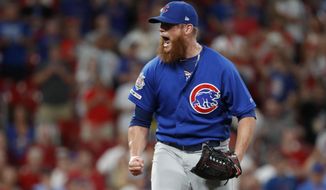 FILE - In this July 31, 2019, file photo, Chicago Cubs relief pitcher Craig Kimbrel celebrates after striking out St. Louis Cardinals&#39; Yairo Munoz for the final out of a baseball game in St. Louis. The 32-year-old Kimbrel is looking to bounce back from one of the worst stretches of his stellar career. The seven-time All-Star closer never looked right after he got a late start last year, going 0-4 with a career-high 6.53 ERA and three blown saves in 16 chances. (AP Photo/Jeff Roberson, File)