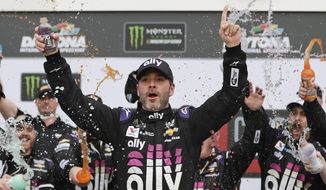 - In this Feb. 10, 2020, file photo, Jimmie Johnson celebrates in Victory Lane after winning the NASCAR Clash auto race at Daytona International Speedway in Daytona Beach, Fla. Seven-time NASCAR champion Jimmie Johnson has twice tested negative for the coronavirus and has been cleared to race Sunday, July 12, 2020 at Kentucky Speedway. Johnson missed the first race of his Cup career when he tested positive last Friday. (AP Photo/John Raoux, File)  **FILE**
