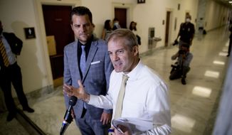 Ranking Member Rep. Jim Jordan, R-Ohio, right, accompanied by Rep. Matt Gaetz, R-Fla., left, speaks to members of the media following a House Judiciary Committee closed door meeting with former federal prosecutor for the Southern District of New York Geoffrey Berman on Capitol Hill, Thursday, July 9, 2020, in Washington. (AP Photo/Andrew Harnik)