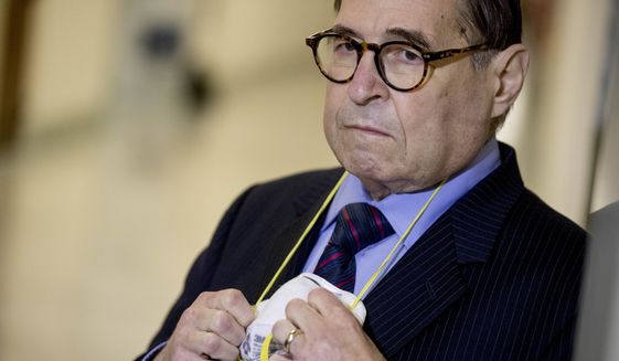 Rep. Jerrold Nadler, D-N.Y., holds his face mask as he appears before members of the media following a House Judiciary Committee closed-door meeting with former federal prosecutor for the Southern District of New York Geoffrey Berman on Capitol Hill, Thursday, July 9, 2020, in Washington. (AP Photo/Andrew Harnik) **FILE**
