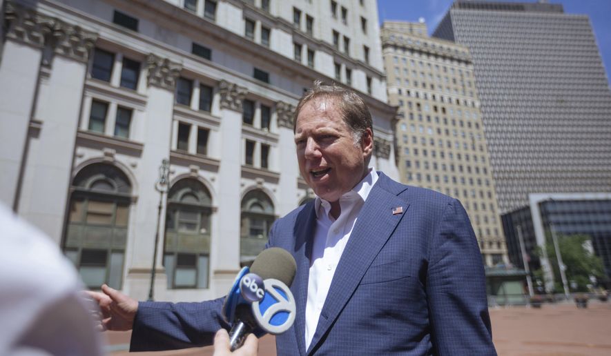 In this June 20, 2020, file photo, Geoffrey S. Berman, then-U.S. attorney for the Southern District of New York, speaks to reporters as he arrives at his office in New York. (AP Photo/Kevin Hagen, File)