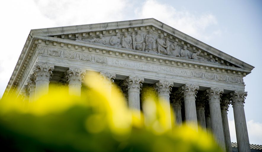 The Supreme Court building is photographed early Thursday, July 9, 2020, in Washington. (AP Photo/Andrew Harnik)