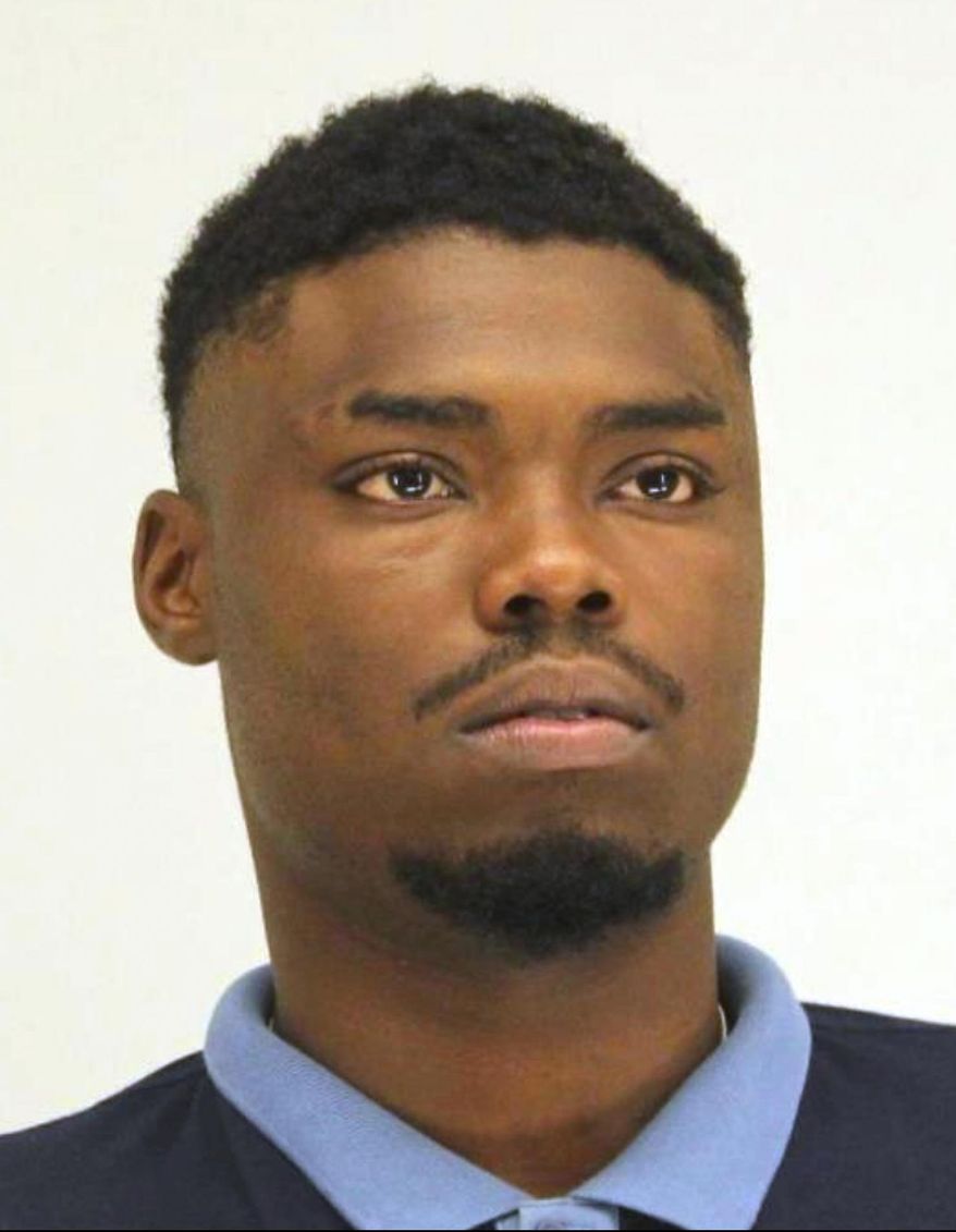 This booking photo provided by the Dallas County Sheriff's Department shows Angelo Walker, a 20-year-old Dallas man arrested and charged with murder in the fatal shooting of a Black transgender woman. Walker was taken into custody Wednesday, July 8, 2020, and is being held in the Dallas County jail on a $900,000 bond. (Dallas County Sheriff's Department via AP)