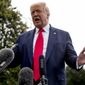 President Donald Trump speaks to members of the media on the South Lawn of the White House in Washington, Friday, July 10, 2020, before boarding Marine One for a short trip to Andrews Air Force Base, Md., and then on to Florida. (AP Photo/Andrew Harnik)