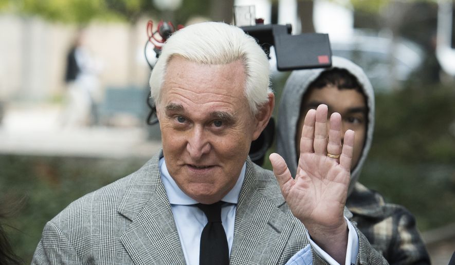 In this Nov. 7, 2019, file photo, Roger Stone arrives at federal court in Washington. (AP Photo/Cliff Owen, File)