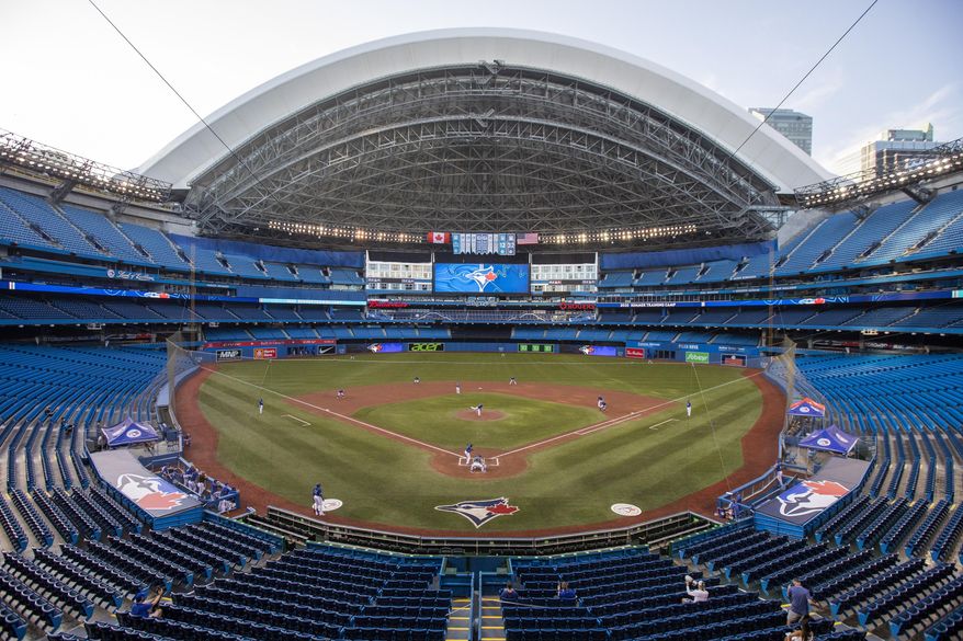 The Toronto Blue Jays play an intrasquad baseball game in Toronto on Thursday, July 9, 2020. (Carlos Osorio/The Canadian Press via AP)