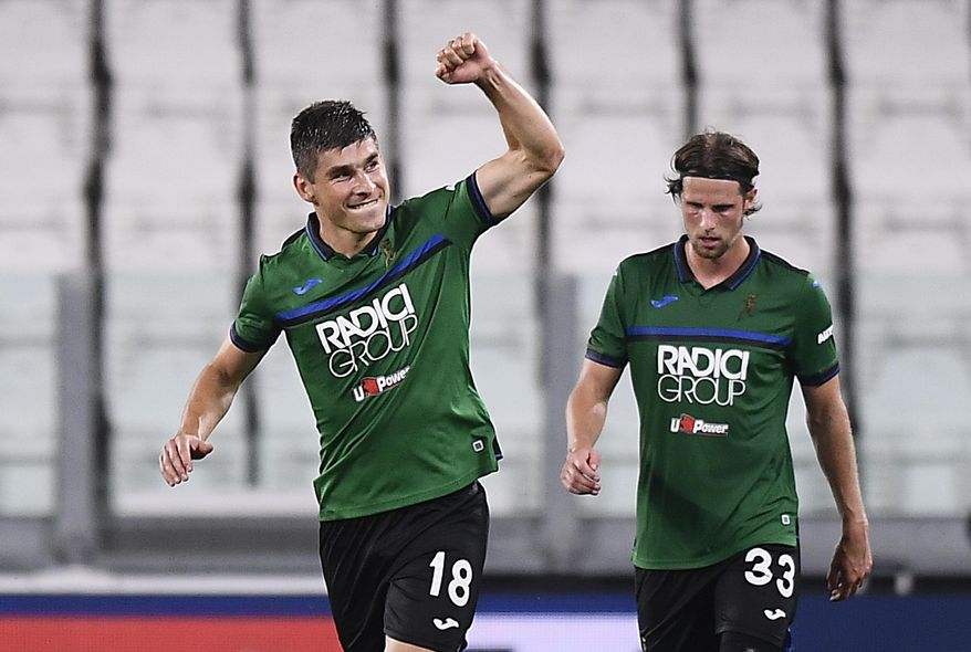 Atalanta's Ruslan Malinovskyi celebrates after a goal during the Serie A soccer match between Juventus and Atalanta at the Allianz Stadium in Turin, Italy, Saturday, July 11, 2020. (Fabio Ferrari/LaPresse via AP)