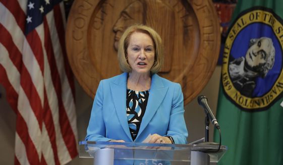 Seattle Mayor Jenny Durkan speaks Monday, July 13, 2020, during a news conference at City Hall in Seattle. Durkan and Police Chief Carmen Best were critical of a plan backed by several city council members that seeks to cut the police department&#39;s budget by 50 percent. (AP Photo/Ted S. Warren)