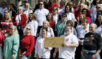 Mission nurses and supporters rally to form a union at Pack Square Park in downtown Asheville , N.C., Sunday, March 8, 2020. (Angela Wilhelm/The Asheville Citizen-Times via AP) ** FILE **