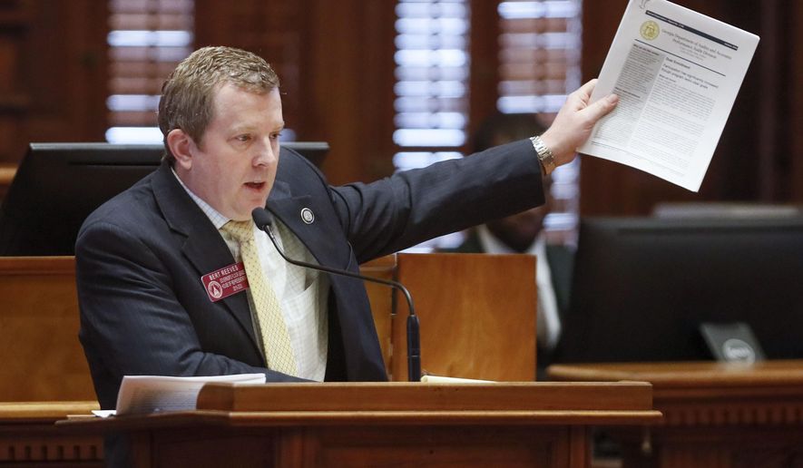 Rep. Bert Reeves, R - Marietta, motions that the House agree to the senate substitute to HB 444, passed, 103-67. The bill amends the "Move on When Ready Act". (Bob Andres/Atlanta Journal-Constitution via AP)