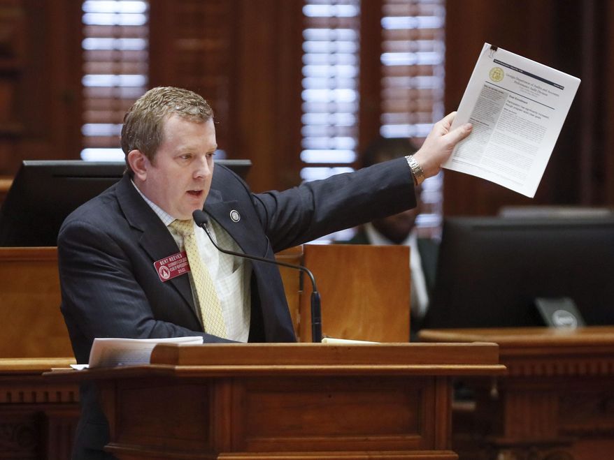 Rep. Bert Reeves, R - Marietta, motions that the House agree to the senate substitute to HB 444, passed, 103-67. The bill amends the "Move on When Ready Act". (Bob Andres/Atlanta Journal-Constitution via AP)