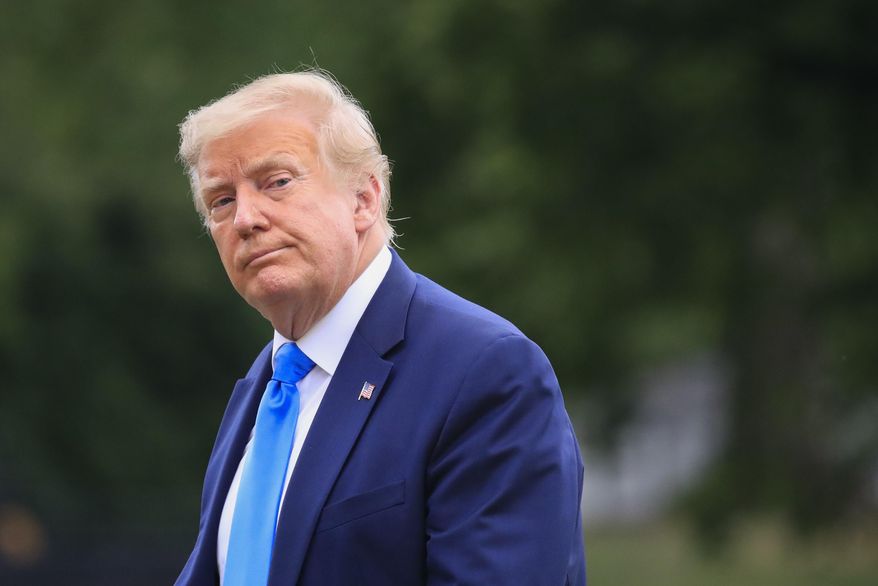President Donald Trump walks across the South Lawn of the White House in Washington, Saturday, July 11, 2020. Trump was returning from a visit to nearby Walter Reed National Military Medical Center in Bethesda, Md. (AP Photo/Pablo Martinez Monsivais)