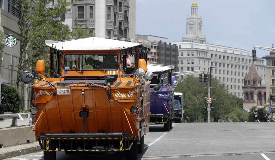 Boston's iconic duck boat tours started rolling again on Monday, July 13, 2020, as the city began Phase 3 of its coronavirus economic restart. Museums, movie theaters, historical sites and gyms in Boston were permitted to reopen Monday with certain restrictions, a week after most of the rest of Massachusetts. (AP Photo/Steven Senne)