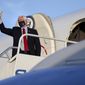 Vice President Mike Pence gives a thumbs-up before departing on Air Force Two from Philadelphia International Airport after a series of stops in Pennsylvania on Thursday, July 9, 2020. (Tim Tai/The Philadelphia Inquirer via AP, Pool)