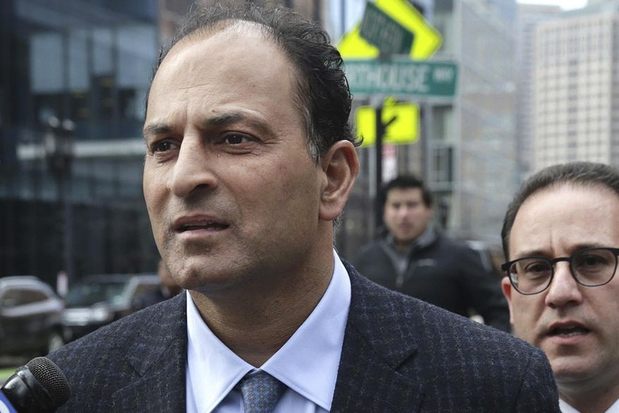 FILE - March 15, 2019, David Sidoo, of Vancouver, Canada, leaves following his federal court hearing in a nationwide college admissions cheating scheme in Boston. Sidoo pleaded guilty to charges in March and is scheduled to be sentenced on Wednesday, July 15, 2020, for paying to have someone take a college entrance exam in place of his two sons. (Jonathan Wiggs/The Boston Globe via AP, File)