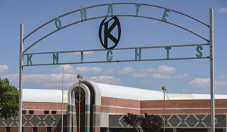 Onate High School is pictured in Las Cruces, New Mexico, on June 17, 2020. The Las Cruces School Board voted Tuesday, July 14, 2020, to drop the name of Don Juan de Onate y Salazar from a high school in southern New Mexico after years of pressure and amid a movement to reexamine the Spanish colonial past in the American Southwest. (Nathan J. Fish/Las Cruces Sun-News via AP)