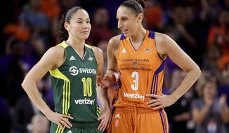 FILE - In this Sept. 6, 2017 file photo, Phoenix Mercury guard Diana Taurasi (3) talks with Seattle Storm guard Sue Bird (10) during the second half of a WNBA basketball playoff game in Tempe, Ariz. Taurasi and Bird know that they are on the tail end of their incredible basketball careers. After both stars missed last season due to injuries, skipping the 2020 season could have meant the end of their illustrious careers because it would have been difficult to return after two years off according to them. (AP Photo/Matt York, File)