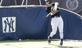 New York Yankees Aaron Judge bats in the cage at Yankees summer baseball training camp, Wednesday, July 15, 2020, at Yankee Stadium in New York. Judge was scratched fom a simulated game earlier in the week but was back on the field Wednesday. (AP Photo/Kathy Willens)