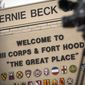 In this April 2, 2014, file photo, members of the media wait outside of the Bernie Beck Gate, an entrance to the Fort Hood military base in Fort Hood, Texas. (AP Photo/Tamir Kalifa, File)  **FILE**