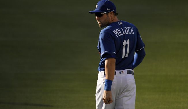Los Angeles Dodgers' A.J. Pollock warms up prior to an intrasquad baseball game Wednesday, July 15, 2020, in Los Angeles. (AP Photo/Mark J. Terrill)