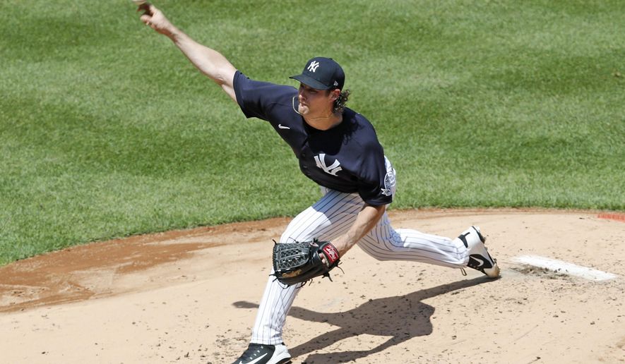 New York Yankees starting pitcher Gerrit Cole delivers during an intrasquad game in baseball summer training camp Sunday, July 12, 2020, at Yankee Stadium in New York. (AP Photo/Kathy Willens)