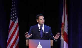 FILE - In this Aug. 21, 2019, file photo, Sen. Marco Rubio, R-Fla., speaks during a Forum Club meeting, in West Palm Beach, Fla. Sen. Rubio mistakenly tweeted a photo of himself and Rep. Elijah Cummings, another Black civil rights icon, in a condolence message Saturday, July 18, 2020, meant to honor Rep. John Lewis. The faux pas was quickly discovered and the Rubio replaced it with a video of himself and Lewis at a Miami event. Lewis died Friday at the age of 80. (AP Photo/Brynn Anderson, File)