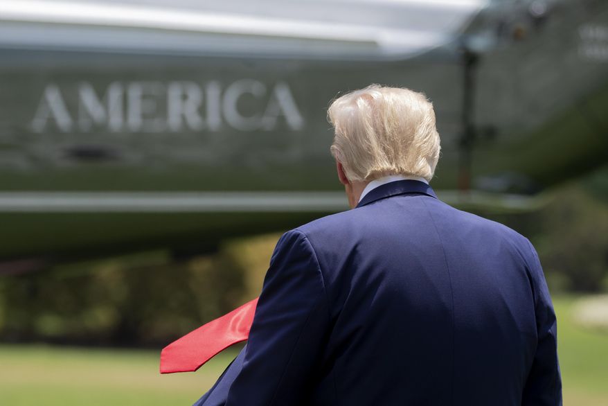 FILE - In this July 15, 2020, file photo President Donald Trump walks on the South Lawn of the White House in Washington before boarding Marine One for a short trip to Andrews Air Force Base, Md., and then on to Atlanta. President Donald Trump has taken an increasingly hands-off approach to the coronavirus crisis in recent days even as COVID-19 related deaths and positive cases have surged to record highs in a huge slice of the country, including areas where he has enjoyed strong support.(AP Photo/Patrick Semansky, File)