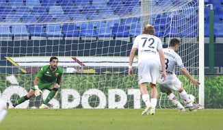 Mancosu Marco of Lecce takes a penalty kick, but does not score against Genoa, during the Serie A soccer match between Genoa and Lecce, at the Luigi Ferraris Stadium in Genoa, Italy, Sunday, July 19, 2020. (Tano Pecoraro/LaPresse via AP)