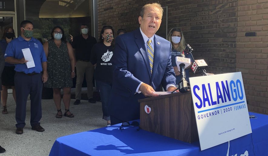 Fred Albert, president of the West Virginia chapter of the American Federation of Teachers, speaks at a news conference Monday, July 20, 2020, in Charleston, W.Va. Albert said that based on current trends with the coronavirus pandemic, he doubts that public schools in the state would be able to reopen safely in early September. Confirmed virus cases in West Virginia have doubled over the past month. (AP Photo/John Raby)
