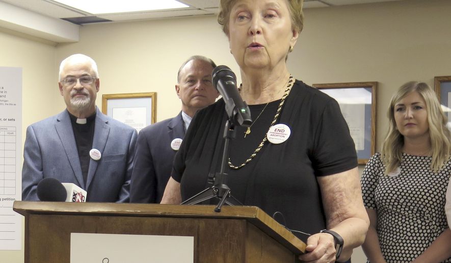 FILE - In this June, 26, 2019 file photo, Barbara Listing, president of Right to Life of Michigan, speaks during a news conference, in Lansing, Mich. Abortion opponents said Tuesday, July 21, 2020, they're dropping a petition drive to prohibit a second-trimester procedure in Michigan after state election officials said the campaign didn't produce enough valid signatures. Right to Life of Michigan said it won't contest the conclusion when the Board of State Canvassers meets Friday. (AP Photo/David Eggert, File)