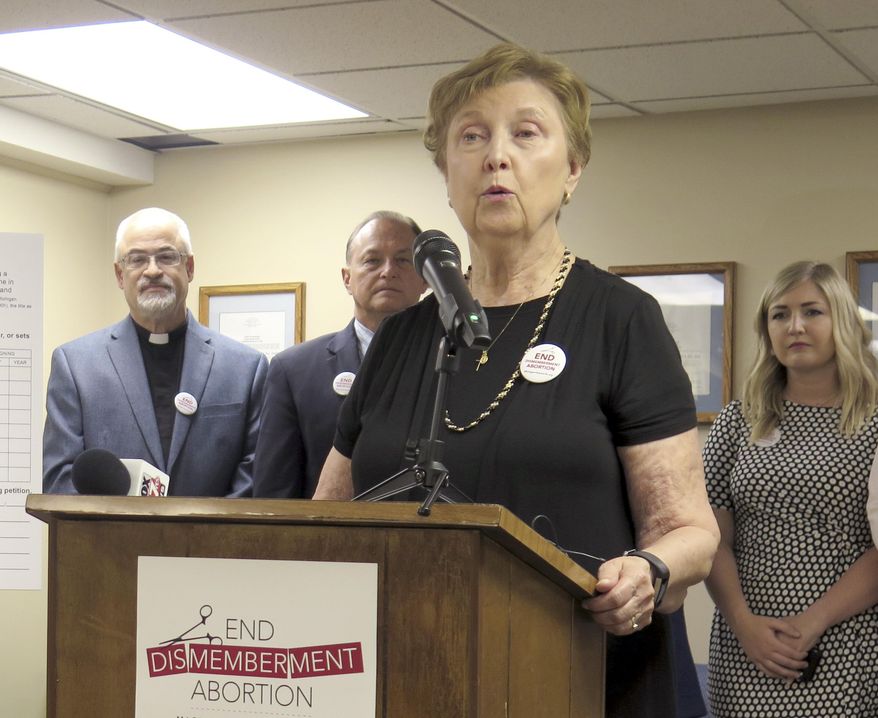 FILE - In this June, 26, 2019 file photo, Barbara Listing, president of Right to Life of Michigan, speaks during a news conference, in Lansing, Mich. Abortion opponents said Tuesday, July 21, 2020, they're dropping a petition drive to prohibit a second-trimester procedure in Michigan after state election officials said the campaign didn't produce enough valid signatures. Right to Life of Michigan said it won't contest the conclusion when the Board of State Canvassers meets Friday. (AP Photo/David Eggert, File)