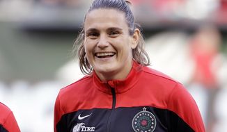 FILE - This is an Aug. 30, 2015, file photo showing Portland Thorns&#39; Nadine Angerer before an NWSL soccer match against the Washington Spirit in Portland, Ore. Former German national team goalkeeper Nadine Angerer has suddenly and unexpectedly found herself on the bench for the Portland Thorns, poised to play as the team navigates injuries at the Challenge Cup tournament. The 42-year-old goalkeeping coach for the Thorns retired from playing five years ago. (AP Photo/Don Ryan, File)