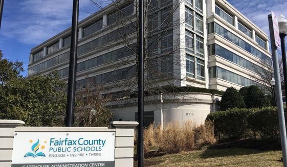 This March 4, 2019, file photo shows Fairfax County Public Schools in Merrifield, Va. (AP Photo/Matthew Barakat, File)