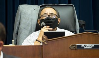 In this June 29, 2020, file photo, Committee Chairman Rep. Raul Grijalva, D-Ariz., listens on Capitol Hill in Washington, during the House Natural Resources Committee hearing. (Bonnie Cash/Pool via AP) ** FILE **