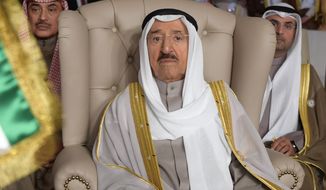 FILE - In this March 31, 2019 file photo, Kuwait&#39;s ruling emir, Sheikh Sabah Al Ahmad Al Sabah, attends the opening of the 30th Arab Summit, in Tunis, Tunisia. Kuwait said its 91-year-old ruling emir, who recently underwent surgery, will travel to the U.S. on Thursday for further medical care. That’s according to a report late Wednesday, July 22, 2020, by the state-run KUNA news agency. Sheikh Sabah’s sudden surgery could inspire a renewed power struggle within Kuwait’s ruling family. (Fethi Belaid/Pool Photo via AP, File)