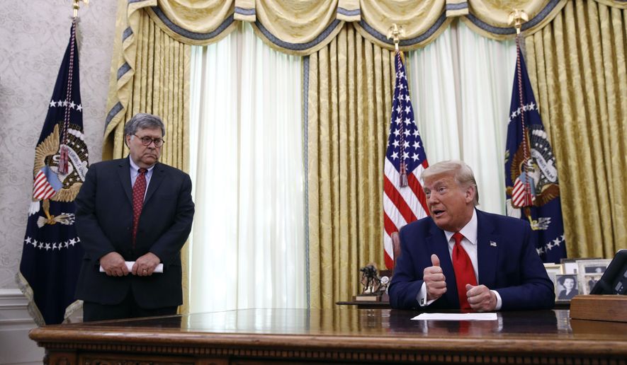 President Donald Trump speaks alongside Attorney General William Barr during a law enforcement briefing on the MS-13 gang in the Oval Office of the White House, Wednesday, July 15, 2020, in Washington. (AP Photo/Patrick Semansky)