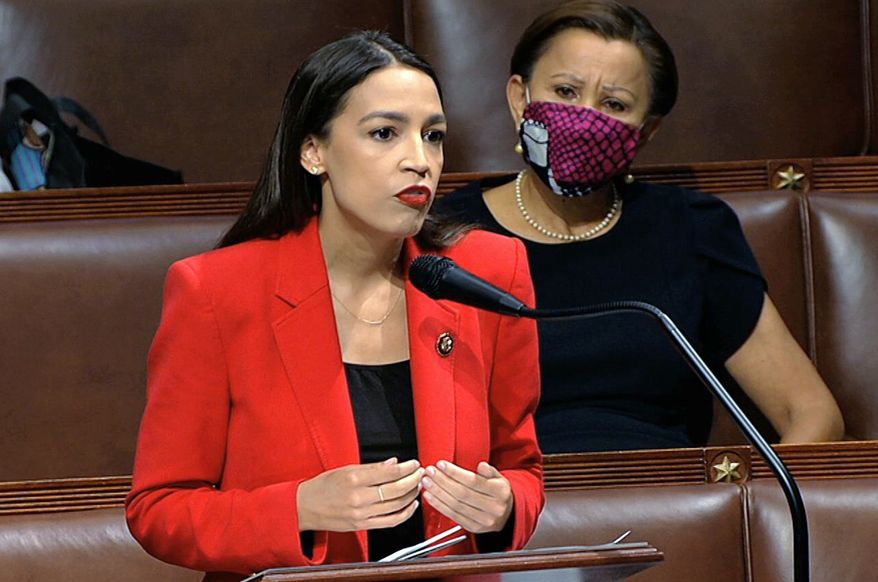 Rep. Alexandria Ocasio-Cortez, D-N.Y., speaks on the House floor, Thursday, July 23, 2020 on Capitol Hill in Washington. Ocasio-Cortez's objections to a Republican lawmaker's verbal assault on her expanded Thursday as she and other Democrats took to the House floor to demand an end to a sexist culture of accepting violence and violent language against women. Rep. Nydia Velázquez, D-N.Y., is seated right. (House Television via AP) ** FILE **