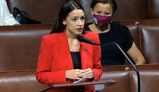 In this image from video, Rep. Alexandria Ocasio-Cortez, D-N.Y., speaks on the House floor, Thursday, July 23, 2020 on Capitol Hill in Washington.   Ocasio-Cortez&#39;s objections to a Republican lawmaker&#39;s verbal assault on her expanded Thursday as she and other Democrats took to the House floor to demand an end to a sexist culture of “accepting violence and violent language against women.”  Rep. Nydia Velázquez, D-N.Y., is seated right. (House Television via AP)