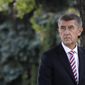 FILE - In this Oct. 26, 2018 file photo Czech Republic&#x27;s Prime Minister Andrej Babis waits in front of his residency in Prague, Czech Republic. On Wednesday, Dec. 4, 2019. Two Czech nationals sentenced in Turkey to stiff prison terms three years ago on terror charges have been released and were heading home, Czech Prime Minister Andrej Babis said on Friday July 24, 2020. Babis said that Miroslav Farkas and Marketa Vselichova were flying onboard of a Czech government plane and will be treated by doctors on arrival. Turkey accused the two of belonging to YPG, a Kurdish group that has been battling Islamic State militants with the aid of U.S. airstrikes. (AP Photo/Petr David Josek, File)