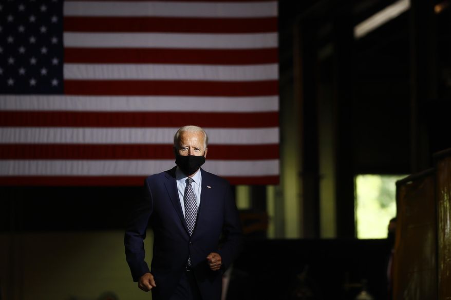 In this July 9, 2020, file photo, Democratic presidential candidate former Vice President Joe Biden arrives to speak at McGregor Industries in Dunmore, Pa. (AP Photo/Matt Slocum, File)