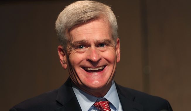 Sen. Bill Cassidy, R-La., delivers remarks to media after registering as a candidate to run as an incumbent in Baton Rouge, La., Friday, July 24, 2020. (AP Photo/Gerald Herbert)