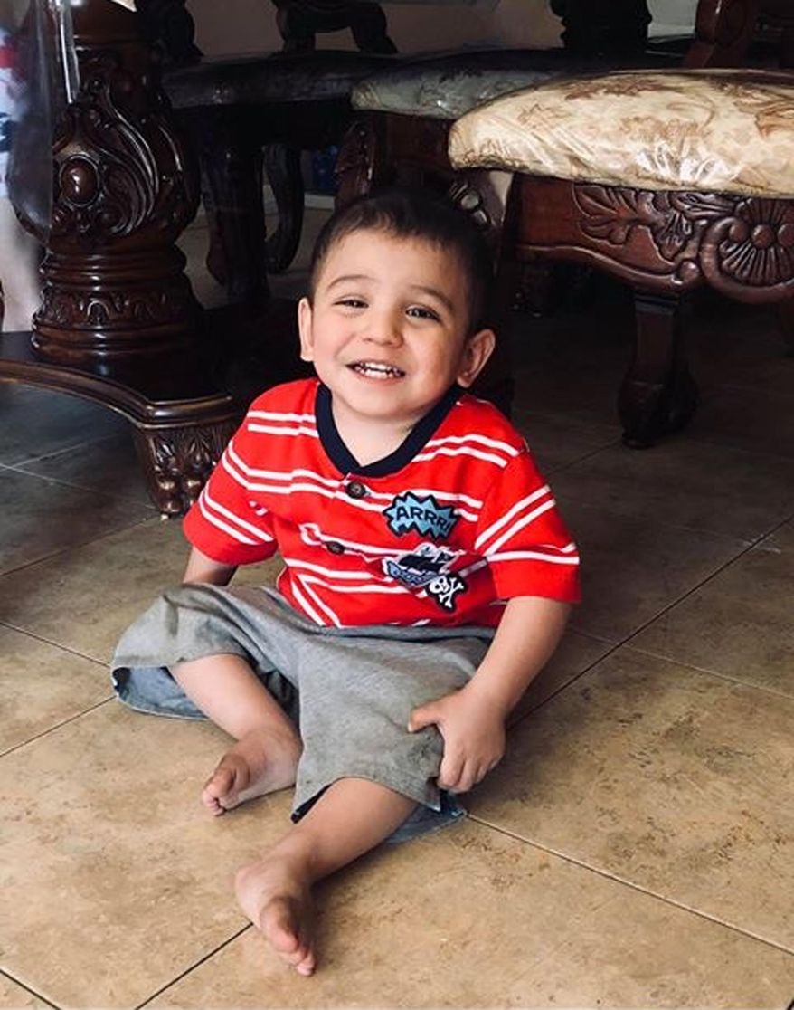 This undated photo provided by the Madera Police Department, in California, shows Thaddeus Sran. The parents of 2-year-old Thaddeus, who is missing, were arrested on suspicion of murder, Friday, July 24, 2020, a day after police found remains of a child in a remote area outside Madera, believed to be those of Thaddeus. Madera Police Chief Dino Lawson said Briseida Sran and Sukhjinder Sran were arrested at a home in Madera, the Fresno Bee reported. (Courtesy of Madera Police Department via AP)