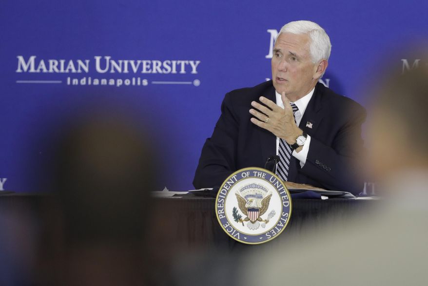 Vice President Mike Pence speaks during a meeting with higher education leaders on safely reopening schools, Friday, July 24, 2020, in Indianapolis. (AP Photo/Darron Cummings)